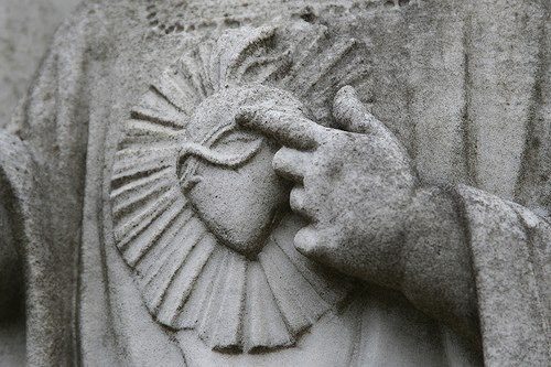 Sacred Heart stone sculpture — symbol for remote and virtual spiritual mentorship sessions